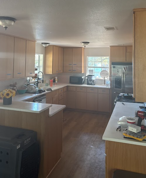 Kitchen renovation in progress with new cabinetry